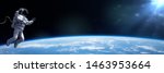 astronaut in EVA spacesuit performing a spacewalk (3d rendering banner, elements of this image are furnished by NASA)