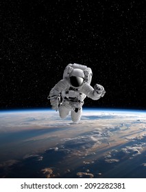 Astronaut in outer open space over the planet Earth.Stars provide.erforming a space above planet Earth.Sunrise,sunset.Our home.ISS.Elements of this Image Furnished by NASA.3D illustration.