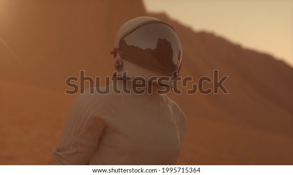 Astronaut wearing space suit on the surface of\
mars. Exploring mission to mars. Colonization and space exploration\
concept. 3d\
rendering.