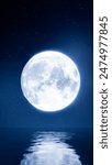 Astronomical Phenomenon the blue full moon is reflected in the sea. The shadow of the island in the ocean The sky has many stars. Ripples on the sea at night.3D Rendering