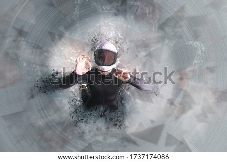 Similar – A woman disposes of red bin liners in the residual waste garbage can