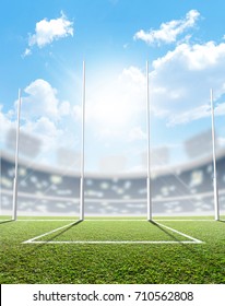 An Aussie Rules Football Stadium With A Marked Green Grass Pitch And Goal Posts In The Daytime Under A Blue Sky - 3D Render