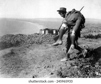 An Australian soldier carrying a wounded comrade during the WWI, Dardanelles Campaign. 1915.