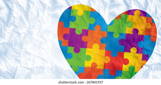 Autism Awareness Heart Against Crumpled White Page