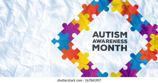 Autism Awareness Month Against Crumpled White Page