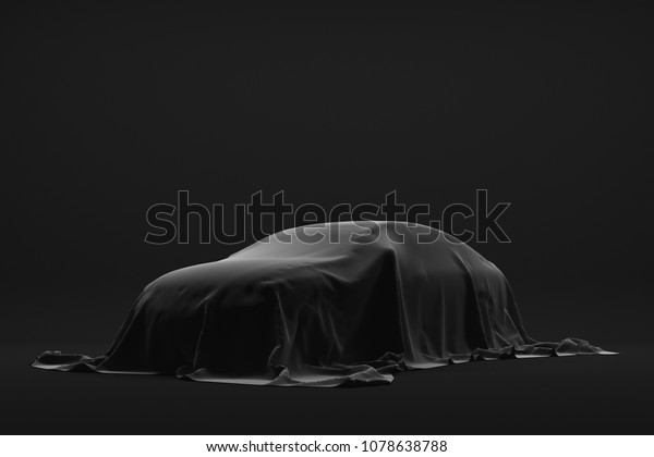 The Automobile is covered dark cloth on a black\
background. 3d\
rendering