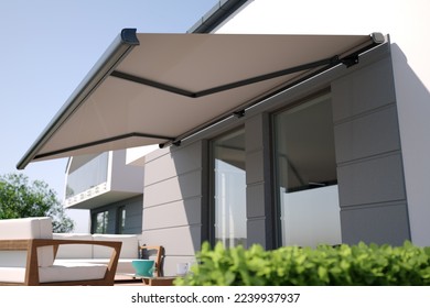 Awning and modern building, 3D illustration
