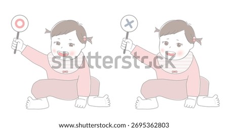 Baby holding correct and incorrect answer cards
