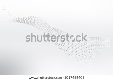 Backdrop grey and white dotted background.