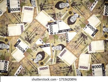 Background of 50000 South Korea Won bills,Group of money stack of 50000 Won banknotes a lot of the background texture, top view