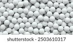 background filled with white golf balls - 3D rendering