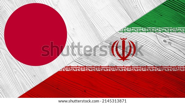 Background with flag of Japan and Iran on\
divided wooden board. 3d\
illustration