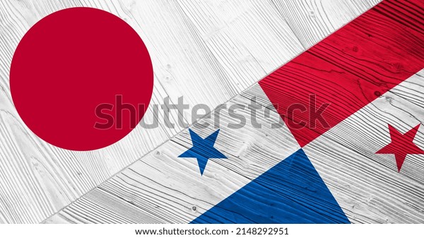 Background with flag of Japan and Panama on\
divided wooden board. 3d\
illustration
