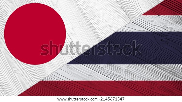 Background with flag of Japan and Thailand\
on divided wooden board. 3d\
illustration