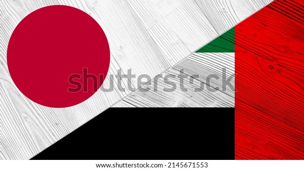 Background with flag of Japan and\
United Arab Emirates on divided wooden board. 3d\
illustration