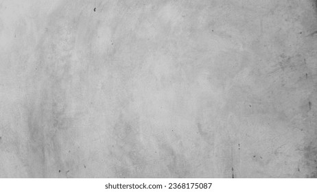 Background image of a gray cement wall with some cracks.