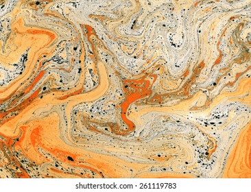 Background with liquid orange and black paints. Beautiful abstract surface. Marble texture. Horizontal wallpaper.