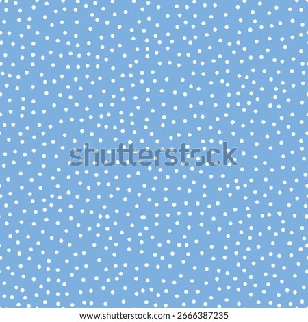 Background of tiny white Polka dots on a blue backdrop. Abstract seamless pattern with randomly spaced dots. Blue background with little dotted circles. Polka dots for Baby shower nursery. Light snow