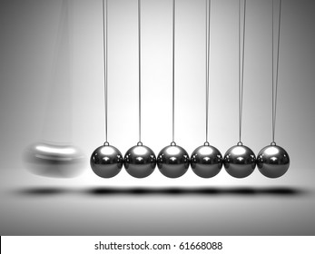 Balancing balls Newton's cradle on grey background