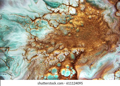 Beautiful abstract background  Golden   dark green mixed acrylic paints  Marble texture  Contemporary art 