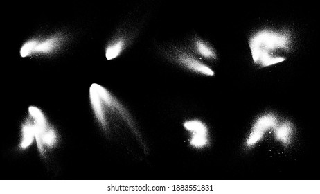 Beautiful abstract design element backdrop. Set of white paint spray brushes isolated on black background