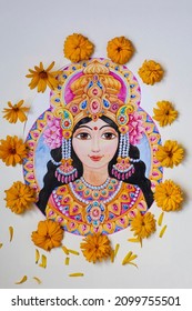 Beautiful goddess Lakshmi with flowers and ornaments painted in watercolors and surrounded by fresh yellow flowers and petals.