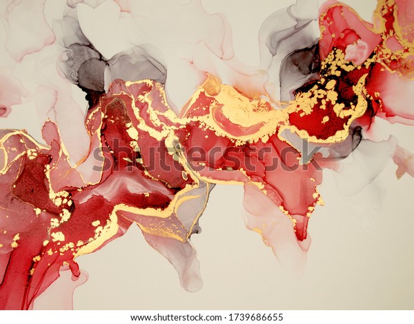 Beautiful\
oriental background. Fluid art, alcohol ink mixture of colors\
creating transparent waves and swirls. Perfect for posters, cards,\
other printed materials. Red and gold\
design.