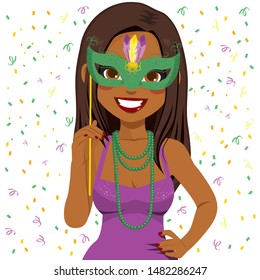 Beautiful Young African American Woman Wearing Mardi Gras Mask And Beads