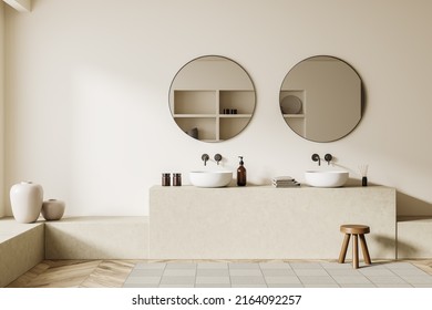 Beige Bathroom Interior With Double Sink And Round Mirror, Stool On Carpet, Hardwood Floor. Hotel Bathing Accessories And Art Decoration. 3D Rendering