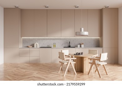 Beige Kitchen Interior With Chairs And Dining Table With Dishes On Hardwood Floor. Kitchenware And Appliances On Deck, Hidden Shelves. 3D Rendering