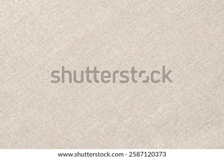 Beige linen texture background, featuring a soft, woven pattern. The beige background adds a natural, subtle elegance to any design. Simple beige textured background with copy space.