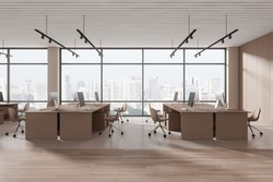 Beige Office Interior With Pc Computers On Desk And Brown Chairs, Hardwood Floor. Stylish Coworking Zone With Panoramic Window On Singapore Skyscrapers. 3D Rendering