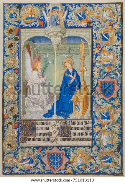 BELLES HEURES OF JEAN DE BERRY, by Limbourg Brothers, 1405-09,French painting, Northern Renaissance. An Annunciation page from an illuminated manuscript. The central scene is bordered by a complex int