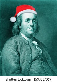 Ben Franklin Is In The Christmas Spirit For The Holiday's Wearing A Santa Hat And A Smile.