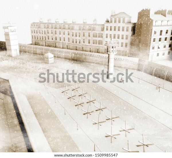 The Berlin Wall was a guarded concrete barrier\
that physically divided Berlin from 1961 to 1989. The barrier\
included guard towers, accompanied by a wide area (death strip),\
militarized. 3d\
render