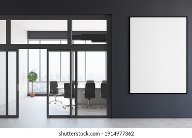 Big Blank White Poster In Black Frame On Black Wall Upon Entering Modern Conference Room With Table, Chairs And City View. Mockup. 3D Rendering