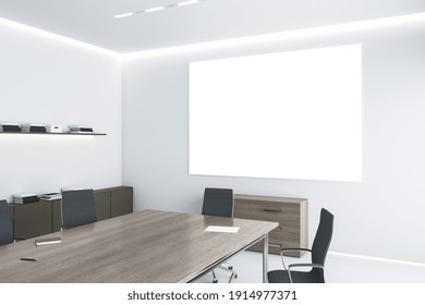 Big Blank White Poster On Light Wall Under Led Lights In Modern Eco Style Office With Wooden Furniture And White Floor. Mockup. 3D Rendering