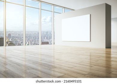 Big Blank White Poster On Beige Partition In Empty Spacious Hall With Wooden Floor And City View From Huge Window. 3D Rendering, Mockup