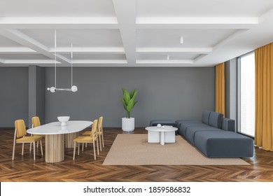 Big Living Room With Yellow Chairs, White Table And Grey Sofa, Side View. Large Windows In Big Hall With Yellow Curtains, Wooden Parquet Floor And Grey Walls, 3D Rendering No People