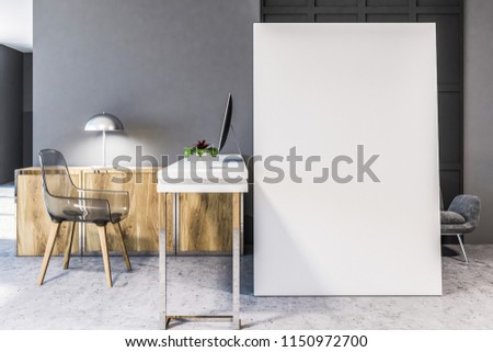 Big vertical poster standing on a concrete floor of a modern Scandinavian style home office with a narrow computer table and a transparent hair. 3d rendering mock up