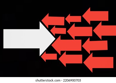 Big White Arrow Against Small Red Arrows And Stand Out Think Different From Others. Leadership And Courage Change Innovative Solution Ideas 