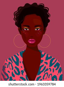 Black African  girlin in a leopard print jacket. Self-confident young woman with brown skin . portrait front view. 