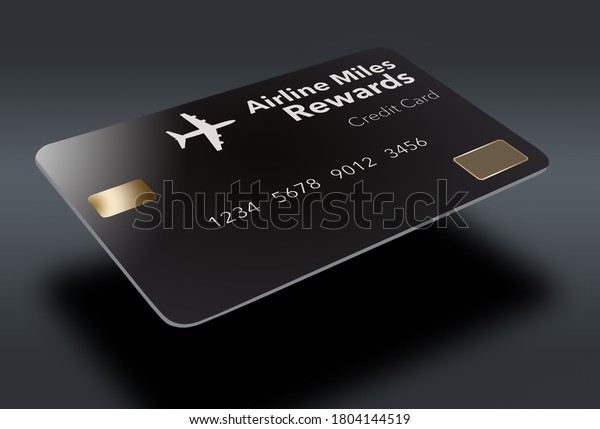 A black air miles rewards credit card is\
seen isolated on a dark \
background.\
