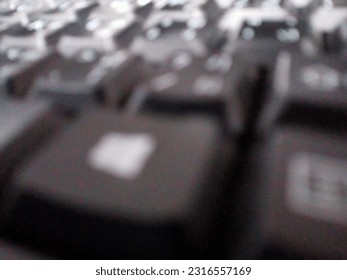 Black blurred background with white pattern.