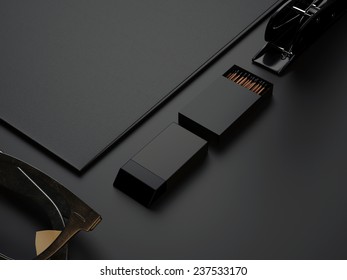 Black Box Of Matches And Other Branding Elements On Paper Background