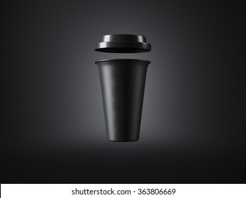 Black coffee cup on the dark background. Front view. 3d rendering