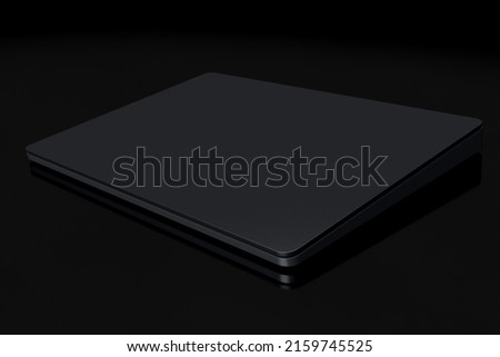 Black computer trackpad or wireless touch pad isolated on black background. 3D rendering of gear for home office and workspace