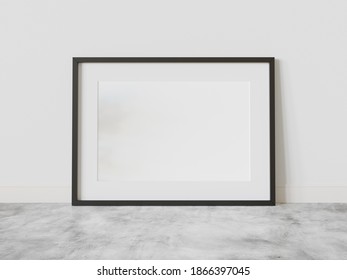 Black Frame Leaning On Floor In Interior Mockup. Template Of A Picture Framed On A Bright Wall 3D Rendering