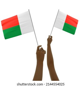 Black Hand Holding Madagascar Flag, Hand Lifting Flag, Hand Raising Flag, 3d Rendering Of Hands Holding Flag Isolated On Background