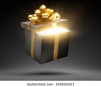 Black open gift box with golden ribbon, light from inside, isolated on black background - 3D illustration